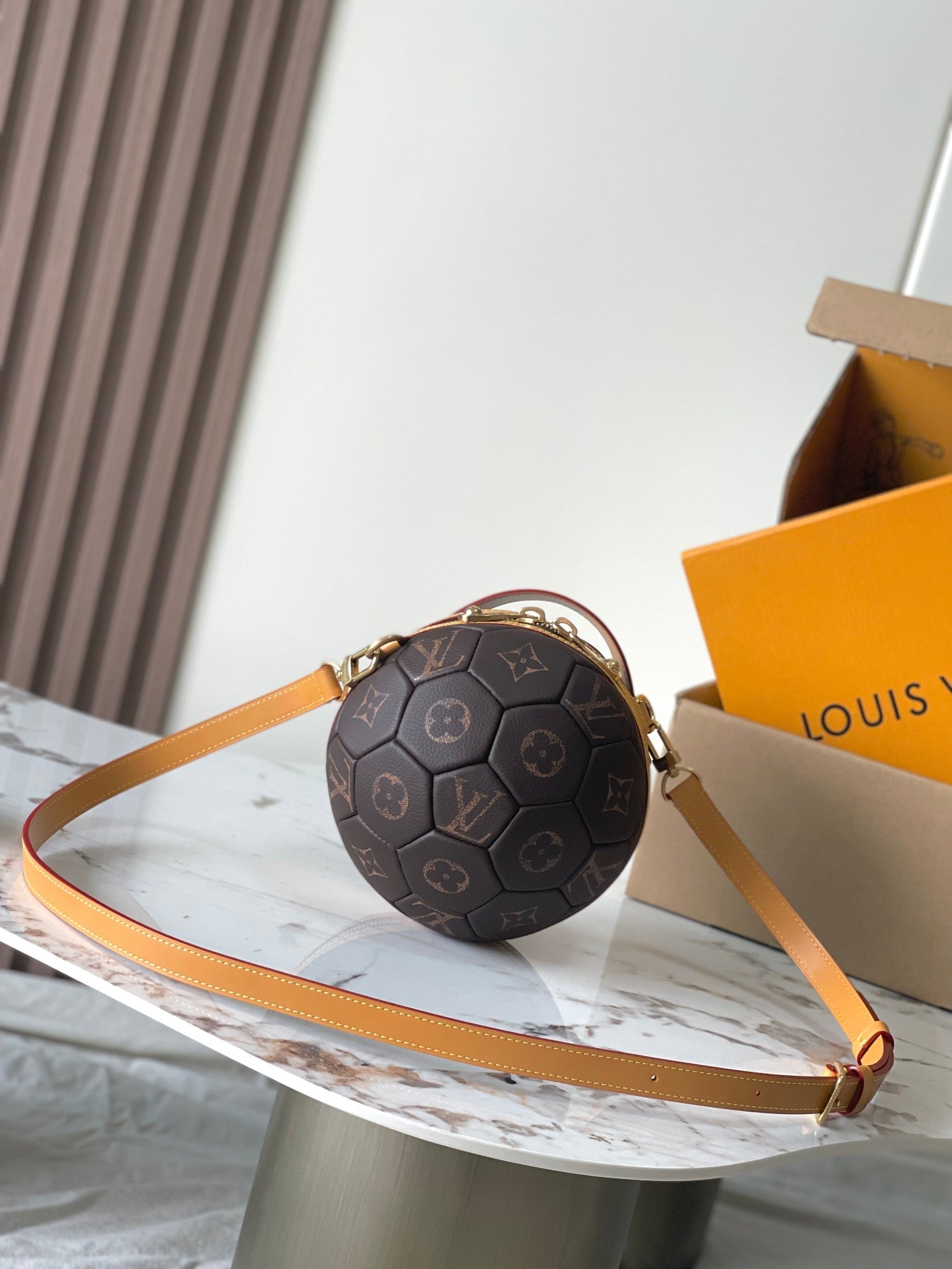 LV Soccer Ball Handbag